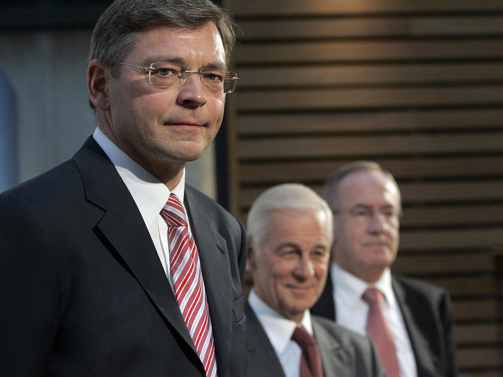 Clausen at a 2006 press conference announcing his appointment as CEO, with then bank President Hans Dalborg and the man he would soon replace, Lars G Norfström