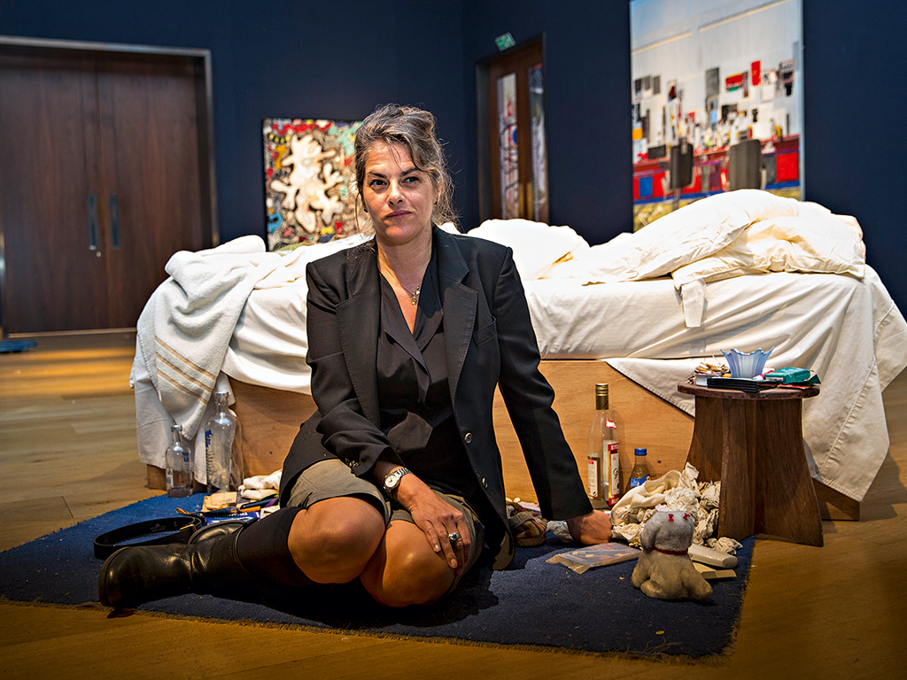 Tracey Emin in front of her notorious My Bed piece for the YBA exhibition