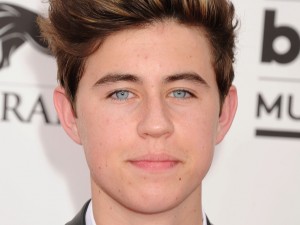 Advertisers are increasingly using social media stars such as Nash Grier (above) - whose Vine account is the most followed in the world - to promote their products and services to the teen market